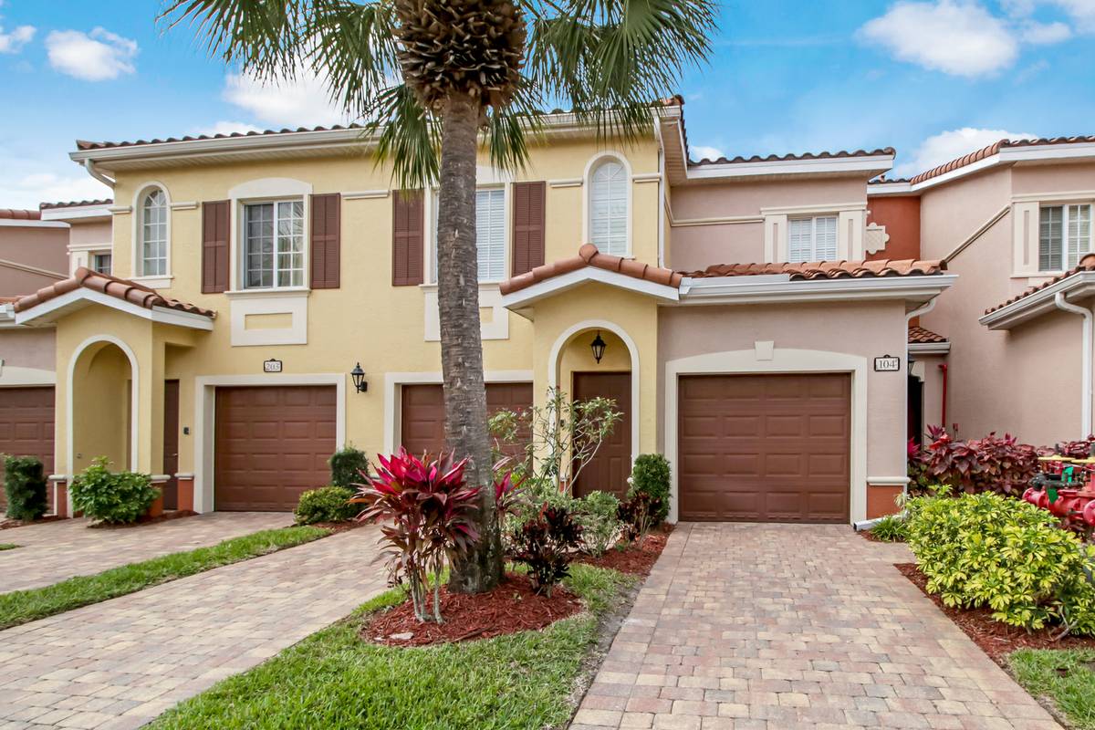 Front of home with 1 car garage - 20321 Estero Gardens Cir