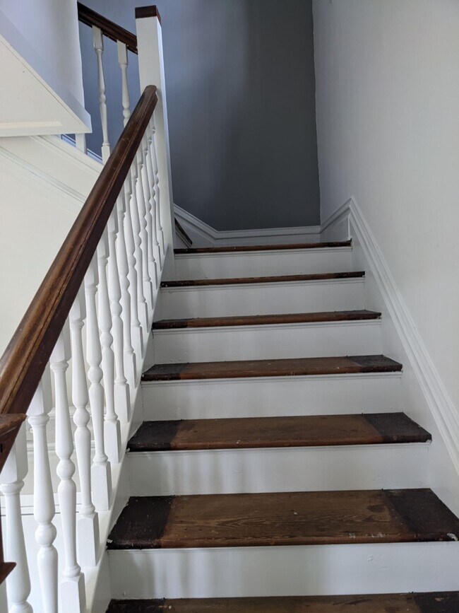 Stairways up to apartment - 1053 Center St