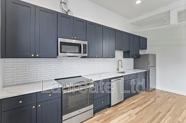 Building Photo - 1736 E 31st Ave