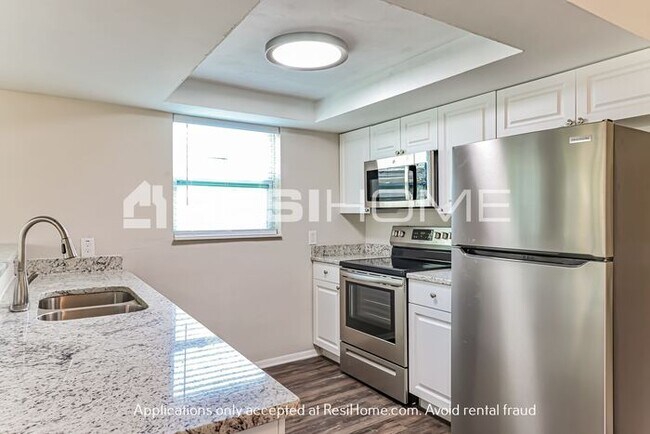 Building Photo - 6027 11th Ave