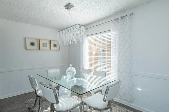 Área de comedor - Parc Place Villas Apartments