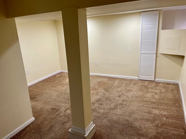 Room in the basement w/ closet and window - 3212 W Garrison Ave