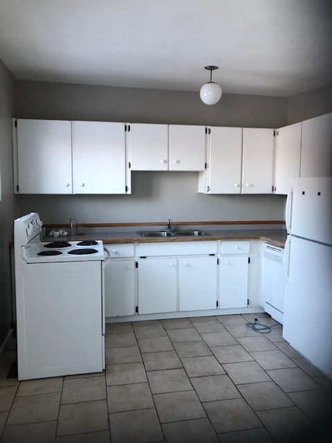 Building Photo - 3 Bed 1.5 Bath Unit in Olds, AB