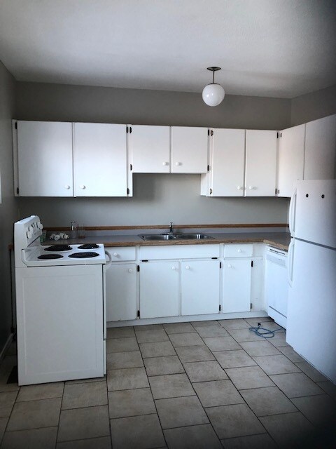 Photo du bâtiment - 3 Bed 1.5 Bath Unit in Olds, AB