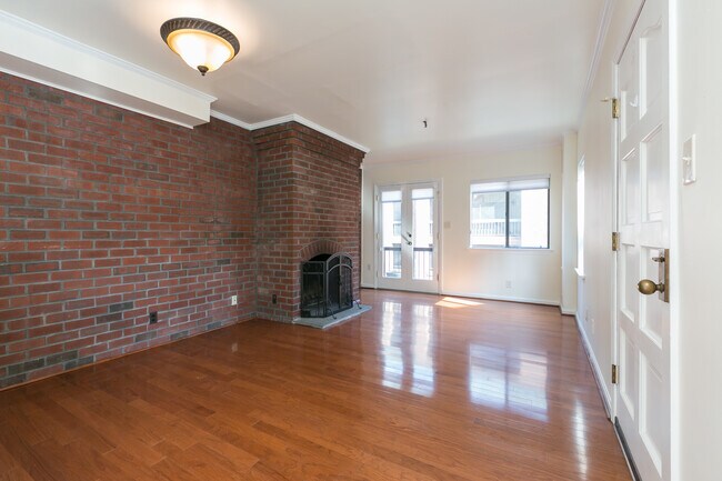 Living room with balcony & Patio entrances - 1080 Paper Mill Ct