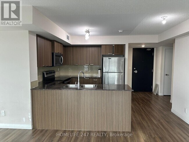 Photo du bâtiment - 1508 Lawrence Ave E