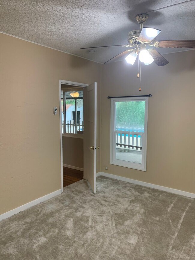 Building Photo - Just in Time For Summer: Charming home wit...