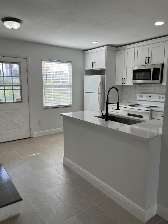 Photo - 7617 Tamarind Ave Townhome