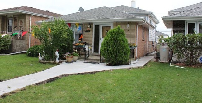 Building Photo - 7524 S Lorel Ave