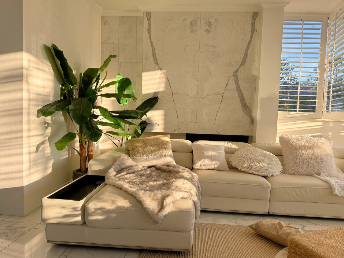 Bright living area, adorned with polished marble - 17368 W Sunset Blvd