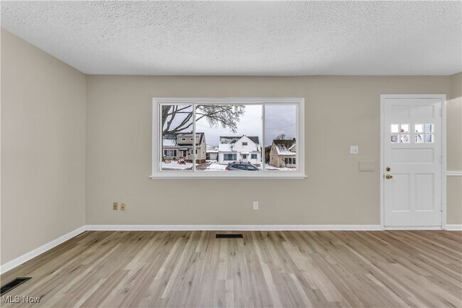 Building Photo - 7611 Newport Ave