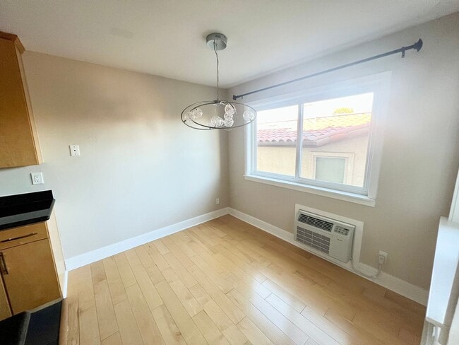 Building Photo - Modern 2BR/2BA Hillcrest Condo with Private Balcony & Amenities