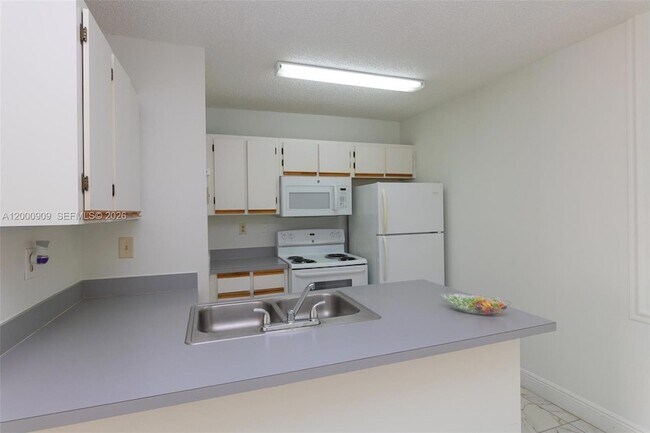 Photo - 18304 NW 68th Ave Apartment