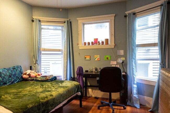 Photo - Spacious 4-Bedroom in Mission Hill | In-Unit Laundry | Available 9/1 Apartment