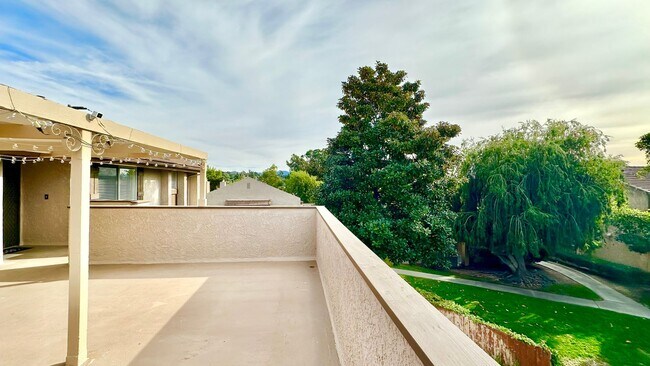 Building Photo - Beautifully Remodeled Upstairs Condo Unit ...