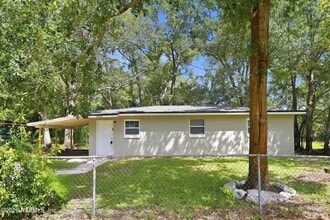 Building Photo - 6923 Miss Muffet Ln N