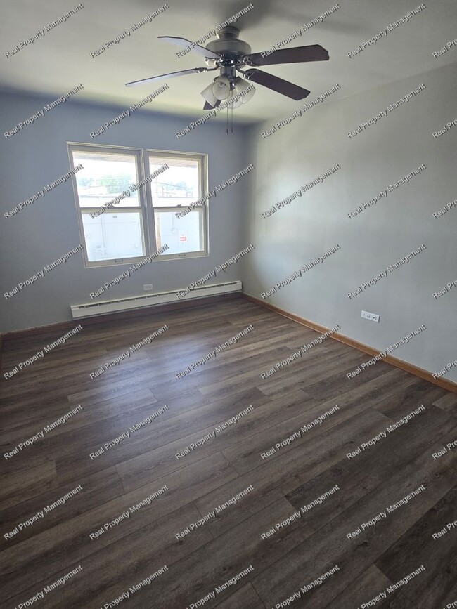 Building Photo - One Bedroom Second Floor Condo
