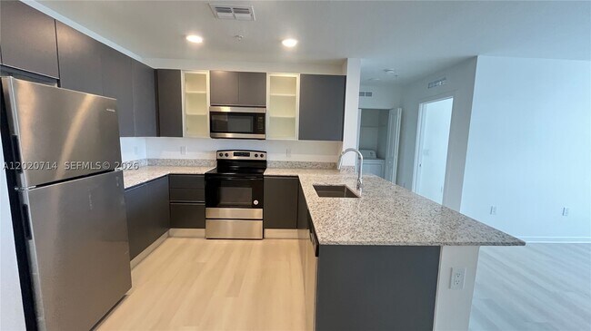 Foto del edificio - 5579 Millennia Park Dr