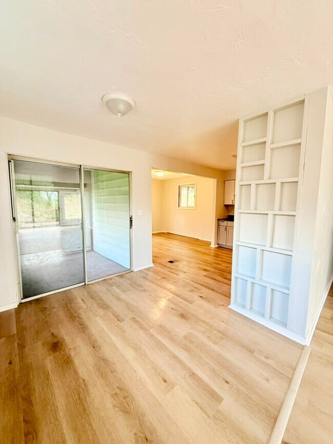 Building Photo - Newly remodeled 3-bedroom, 1.5-bath home featuring granite countertops, central A/C, and a partia...