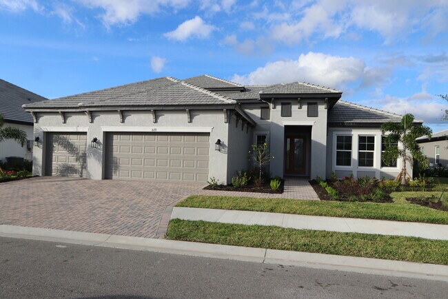 Front - 6133 Lungo Lago Dr