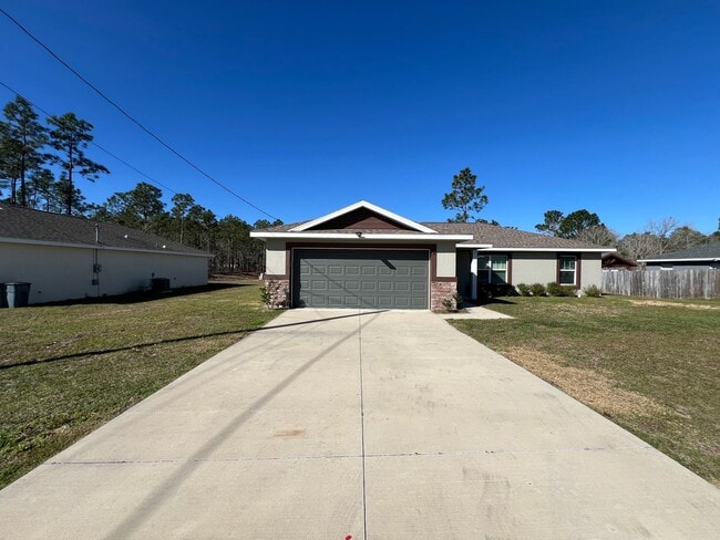Building Photo - 3 BD/2BA Almost Like NEW Home in Beautiful...