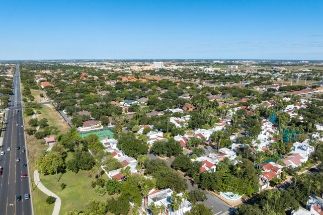 McAllen has plenty of spanish style homes with lush trees near the downtown area.