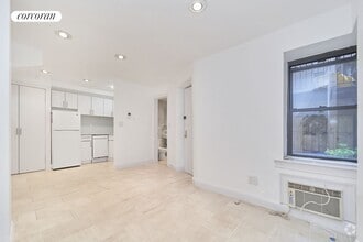 Building Photo - 233 E 12th St