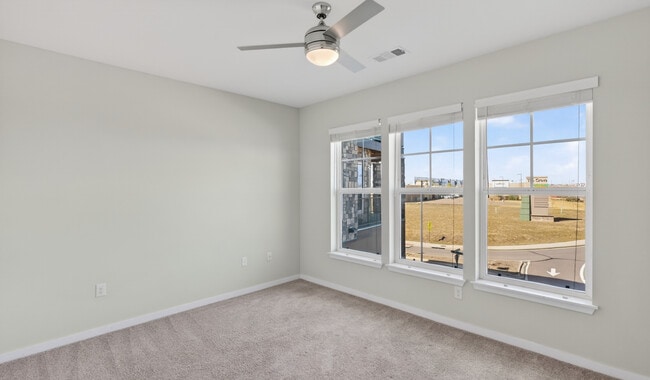 Retreat to a bedroom built for relaxation. - Grant Row Lofts