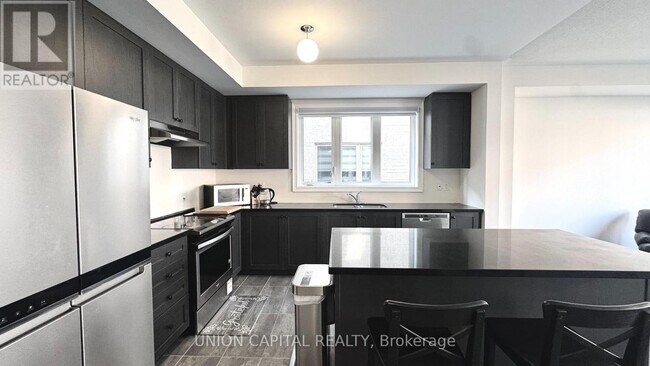 Photo du bâtiment - 63 Erintol Way