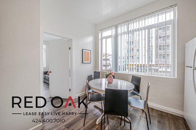 Building Photo - $200 OFF Each Month! Stylish Two Bedroom w...