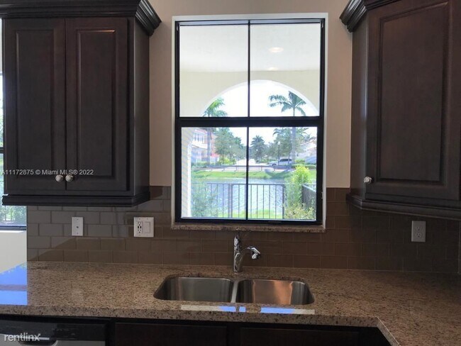 Building Photo - 4 br, 3.5 bath Townhome - 12578 NW 32nd Mnr