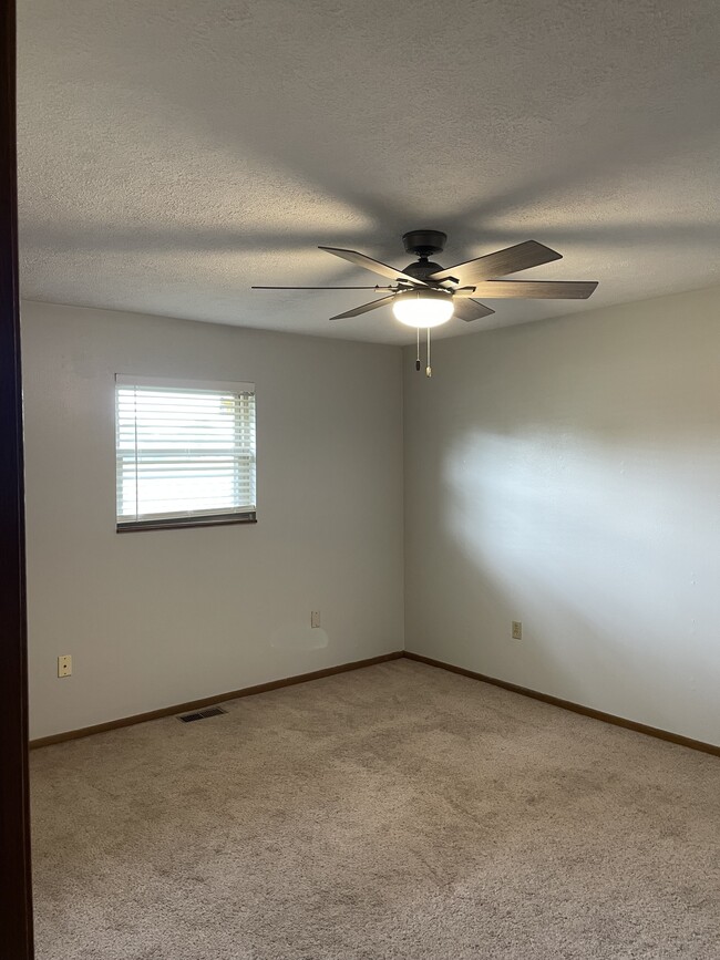 Master bedroom with attached half bath - 409 N 9th St