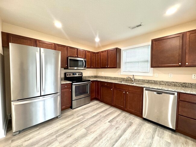 Building Photo - More units and move-in options available.