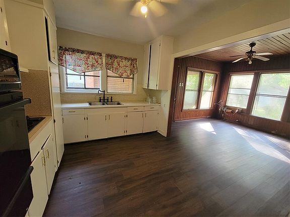 Kitchen & enclosed porch - 1173 Schex Dr