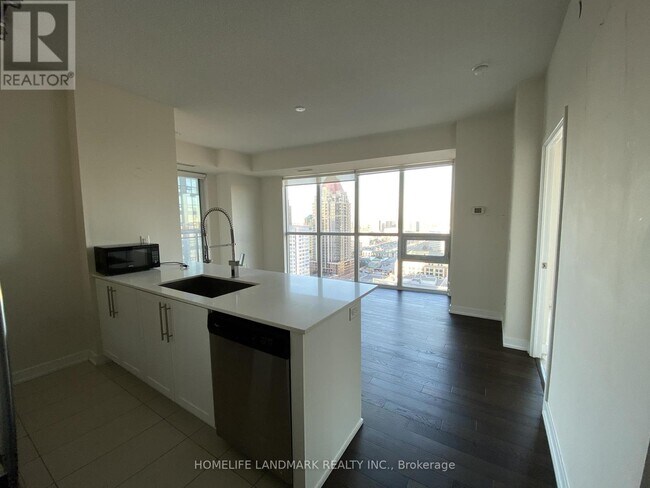Building Photo - 326-4011-4011 Brickstone Mews