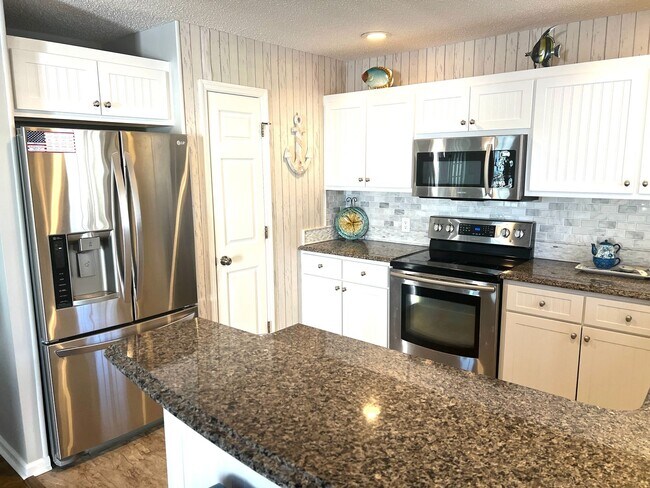 Foto del edificio - Pet Friendly, Furnished 4 Bedroom, 3 Bath ...