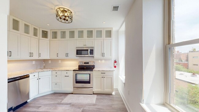 Building Photo - Modern Logan Circle One Bedroom W/Sleek Ki...