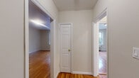This 530 square foot apartment, located at 7 Ashburn Pl in Fair Lawn, NJ, offers a well-designed living space on a single floor. The layout comprises one bedroom, one bathroom, a living room, and two hallways, creating an efficient use of space.

The apartment features gleaming hardwood floors throughout, adding warmth and character to each room. Large windows in both the living area and bedroom allow ample natural light to flood the space, creating a bright and airy atmosphere. The windows also offer pleasant views of the surrounding greenery, connecting the interior with the outdoors.

The living room serves as the heart of the home, providing a versatile space for relaxation and entertainment. The bedroom, measuring 170 square feet, offers a comfortable retreat with enough space for essential furniture.

The bathroom has been renovated with modern fixtures, including a white bathtub with a shower, sleek tiling, and safety features such as a grab bar. A window in the bathroom provides natural light and ventilation.

Heating is provided by classic radiators, adding a touch of vintage charm while ensuring comfort during colder months. The neutral color palette of the walls allows for easy personalization of the space.

This compact yet well-appointed apartment is ideal for single occupancy or a couple, offering a cozy and functional living environment in a convenient New Jersey location.