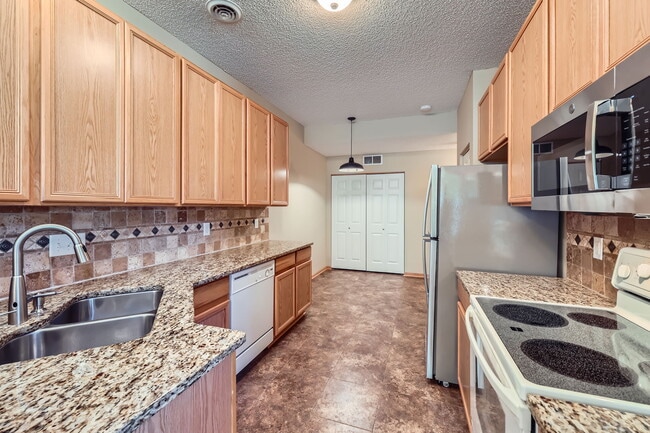 Granite Countertops and Tile Backsplash - 5398 172nd St W