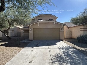 Building Photo - 6731 W Desert Ln