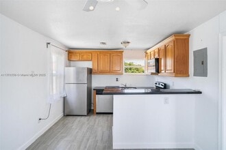 Building Photo - 6221 NW Miami Ct