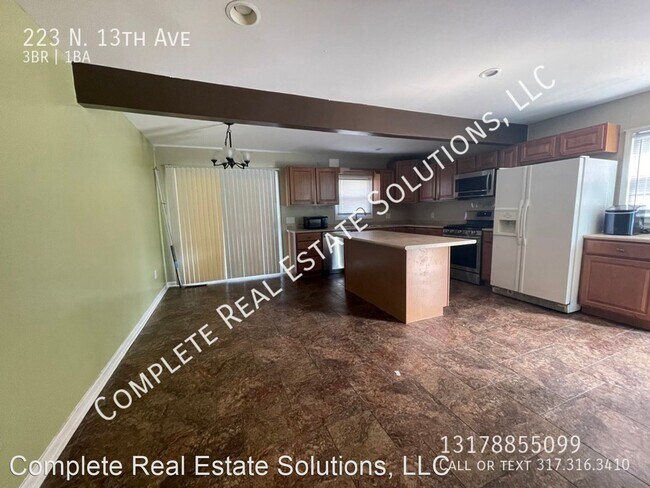 Building Photo - 3 br, 1 bath House - 223 N. 13th Ave