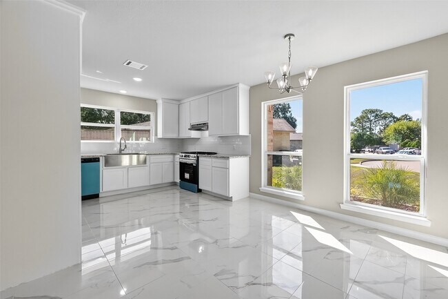 Foto del edificio - 10603 Highland Woods Dr