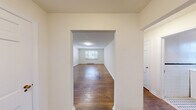 This 600 square foot apartment in Jenkintown, PA, offers a well-designed living space on a single floor. The layout includes one bedroom, one bathroom, a kitchen, a living room, and two hallways, maximizing functionality in a compact area. The primary bedroom, measuring 170 square feet, provides ample space for comfortable living.

Throughout the apartment, hardwood floors add warmth and character, contrasting nicely with the neutral-toned walls. Large windows in the bedroom and living areas allow for natural light, creating a bright and airy atmosphere. The kitchen features modern white cabinetry, granite countertops, and updated appliances, including a gas stove and over-the-range microwave. Subway tile backsplash adds a contemporary touch to the space.

The bathroom, while compact, is efficiently designed with a shower/tub combination and white tiled walls accented by a dark border. The living room is spacious enough to accommodate seating and entertainment options, with a ceiling fan for added comfort. Built-in storage solutions, such as closets with paneled doors, help maximize the available space.

The apartment's layout, as seen in the 3D floor plan, shows a thoughtful design that separates living and sleeping areas for privacy while maintaining an open feel. This property at 841 Highland Ave offers a cozy, well-maintained living space ideal for singles or couples seeking a convenient urban lifestyle in Jenkintown.