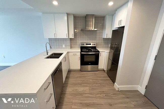 Photo du bâtiment - ERA Apartment Rental 323-22265 Dewdney Tru...