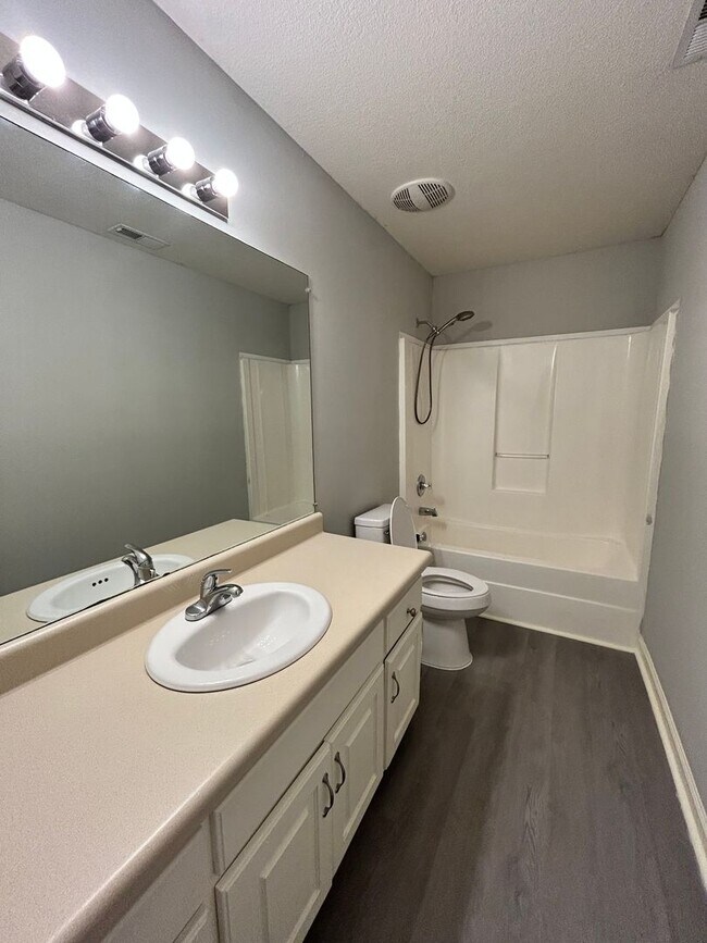 Photo - Charming 2 Bed, 1 Bath, 1 Car Garage, Covered Patio in Private Neighborhood! Townhome
