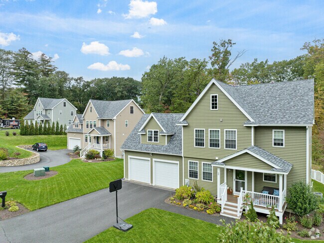 A row of colonial style homes on a cul-de-sac on Ayer's east side.