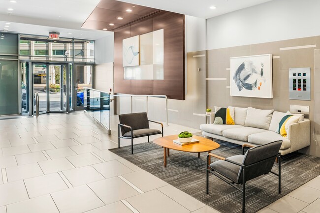A thoughtfully designed lobby that greets you with a sense of home - Newport Rentals