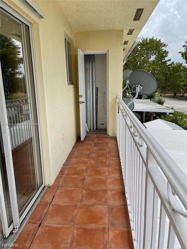 Building Photo - 3 br, 2.5 bath House - 7380 NW 174th Ter A...