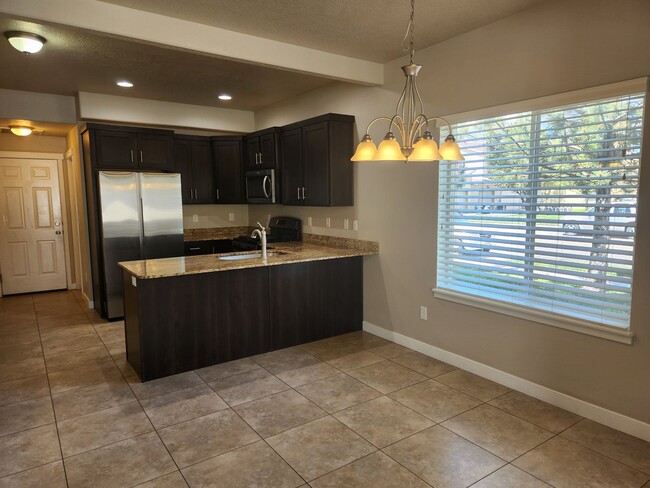 Building Photo - End Unit Townhome Available for Rent July 1st